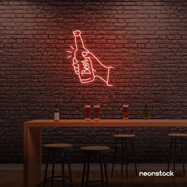 Beer bottle neon sign in peachy pink for bar or man cave wall decor.