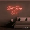 Best Day Ever neon sign in peachy pink for weddings, events, and celebration backdrops.