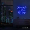 Break the Rules neon sign in dark blue for rebellious decor, creative studios, and bold interiors.
