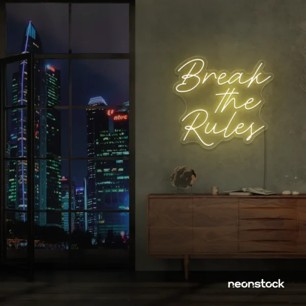 Break the Rules neon sign in warm white for rebellious decor, creative studios, and bold interiors.