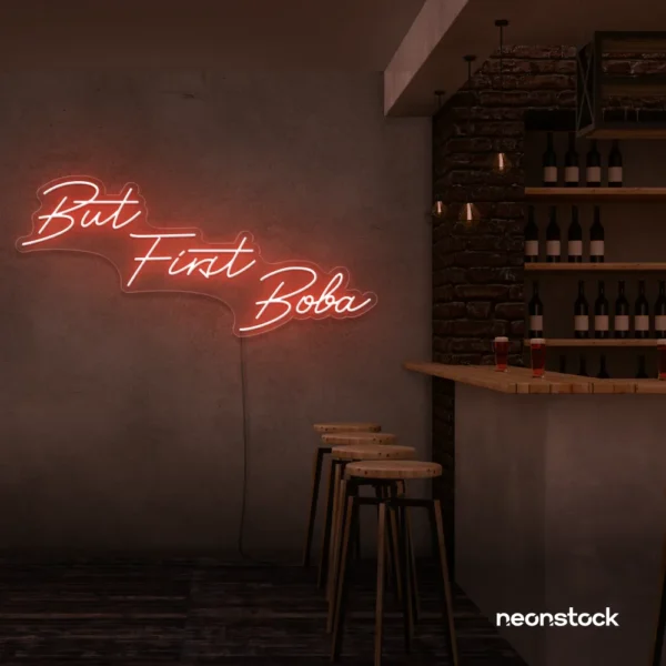 But First Boba neon sign in peachy pink for bubble tea shops, cafés, and playful food decor.