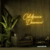 California Dreamin' neon sign in golden yellow for beachy decor, cozy interiors, and travel-inspired rooms.
