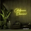 California Dreamin' neon sign in lemon yellow for beachy decor, cozy interiors, and travel-inspired rooms.
