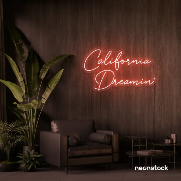 California Dreamin' neon sign in peachy pink for beachy decor, cozy interiors, and travel-inspired rooms.