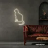 Cat neon sign in neutral white for pet lovers, bedroom wall decor, and cozy spaces.