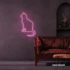 Cat neon sign in baby pink for pet lovers, bedroom wall decor, and cozy spaces.