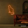 Cat neon sign in orange for pet lovers, bedroom wall decor, and cozy spaces.