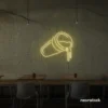 Spilling drink cup neon sign in warm white for coffee shops, juice bars, and beverage-themed decor.