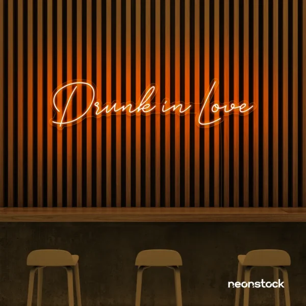 Drunk In Love neon sign in orange for wedding decor, engagement parties, romantic celebrations