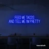 Feed Me Tacos And Tell Me I'm Pretty neon sign in dark blue for taco bars, restaurants, and fun home decor.