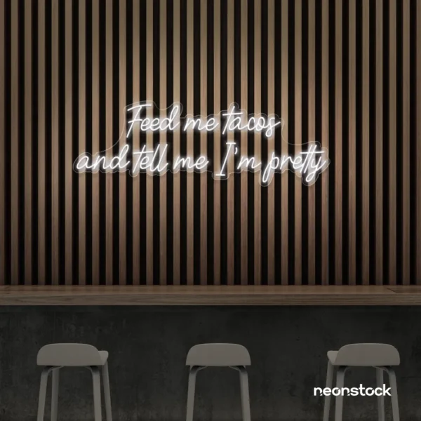 Feed Me Tacos neon sign in white for taco kitchens, Mexican restaurants, and quirky wall art.