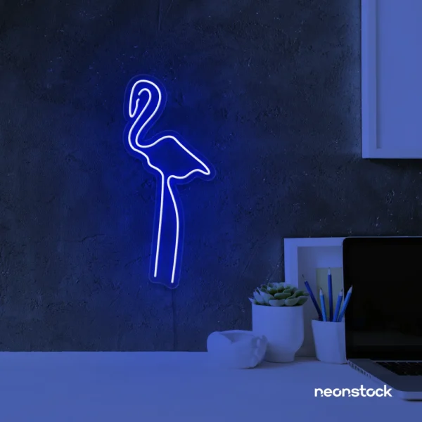 Flamingo neon sign in dark blue for kids room or tropical-themed decor
