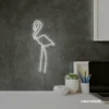 Flamingo neon sign in white for kids room or tropical-themed decor