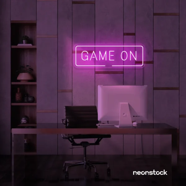 Game On neon sign in baby pink for gaming setups, man caves, and kids' rooms.