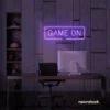 Game On neon sign in purple for gaming setups, man caves, and kids' rooms.