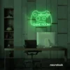 Gaming controller neon sign in green for game rooms, stream setups, and kids' walls.