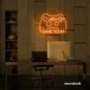 Gaming controller neon sign in orange for game rooms, stream setups, and kids' walls.