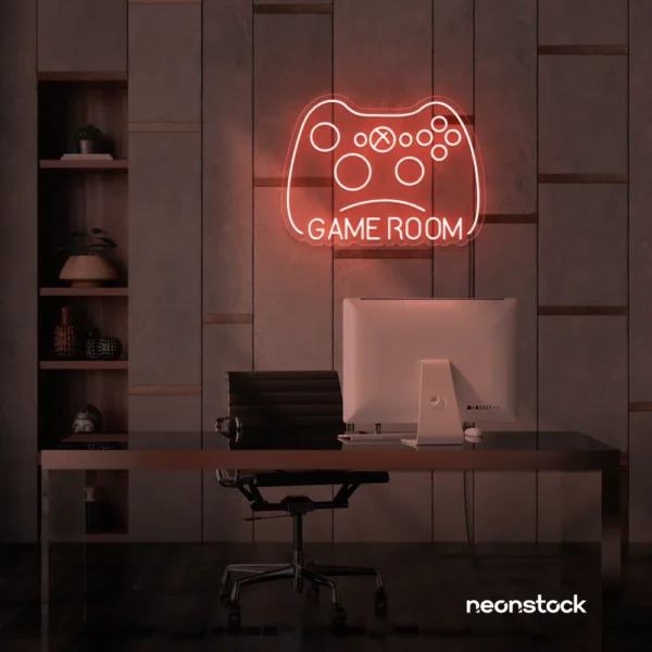 Gaming controller neon sign in peachy pink for game rooms, stream setups, and kids' walls.