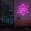 Geometric neon sign in pink – stylish LED wall decor for modern interiors.