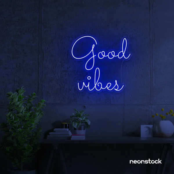 Good Vibes neon sign in dark blue for positive room decor, dorm walls, and relaxing interiors.