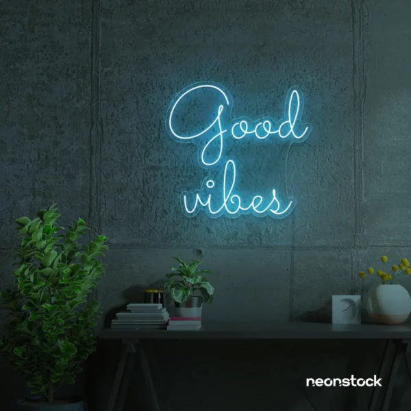 Good Vibes neon sign in ice blue for positive room decor, dorm walls, and relaxing interiors.