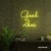 Good Vibes neon sign in lemon yellow for positive room decor, dorm walls, and relaxing interiors.