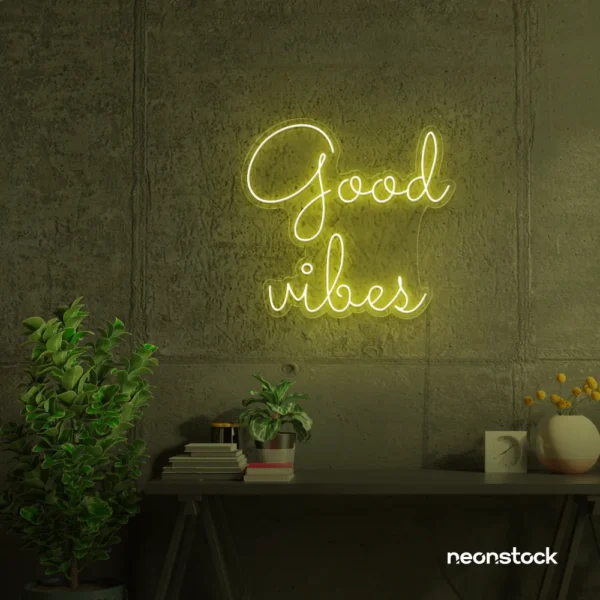 Good Vibes neon sign in lemon yellow for positive room decor, dorm walls, and relaxing interiors.