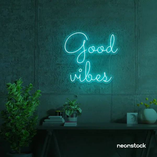 Good Vibes neon sign in mint green for positive room decor, dorm walls, and relaxing interiors.