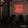 Good Vibes Only neon sign in peachy pink for home, bar, or garage wall decor.