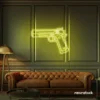 Gun neon sign in lemon yellow – edgy LED wall decor for modern spaces and game rooms.