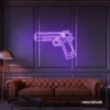 Gun neon sign in purple – edgy LED wall decor for modern spaces and game rooms.