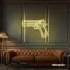 Gun neon sign in warm white – edgy LED wall decor for modern spaces and game rooms.