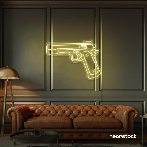 Gun neon sign in warm white – edgy LED wall decor for modern spaces and game rooms.