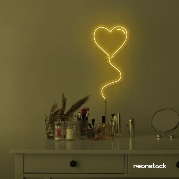 Heart balloon neon sign in golden yellow for kids' rooms, Valentine's Day decor, and romantic wall styling.