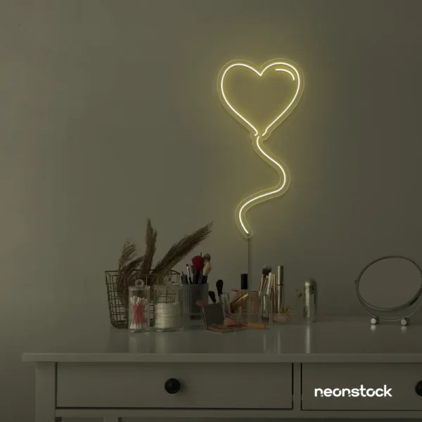 Heart balloon neon sign in warm white for kids' rooms, Valentine's Day decor, and romantic wall styling.