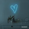 Heart neon sign in ice blue for beauty salons, home decor, dorm rooms, and Valentine's Day themes.