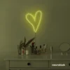 Heart neon sign in lemon yellow for beauty salons, home decor, dorm rooms, and Valentine's Day themes.