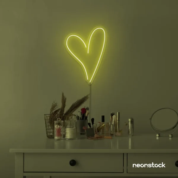 Heart neon sign in lemon yellow for beauty salons, home decor, dorm rooms, and Valentine's Day themes.