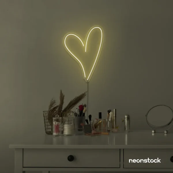 Heart neon sign in warm white for beauty salons, home decor, dorm rooms, and Valentine's Day themes.
