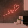 'In Love' neon sign in peachy pink for wedding and Valentine's Day decor