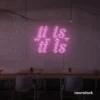 It Is What It Is neon sign in baby pink for calm decor, chill rooms, and positive interiors.