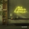 It's So Good To Be Home neon sign in lemon yellow for entryways, living rooms, and cozy home decor.