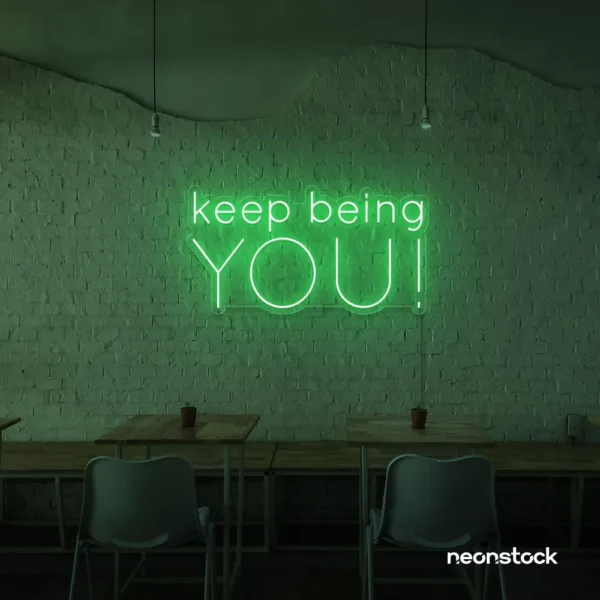 Keep Being You neon sign in green for empowerment decor, teen rooms, and creative wall spaces.