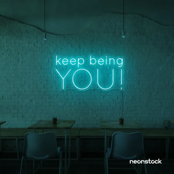 Keep Being You neon sign in mint green for empowerment decor, teen rooms, and creative wall spaces.