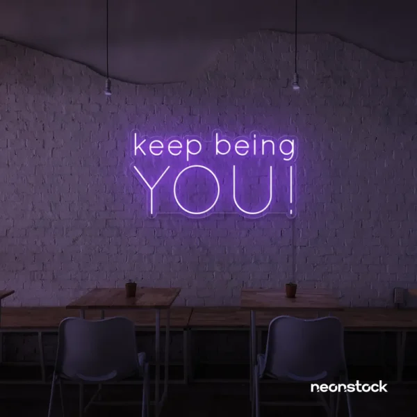 Keep Being You neon sign in purple for empowerment decor, teen rooms, and creative wall spaces.