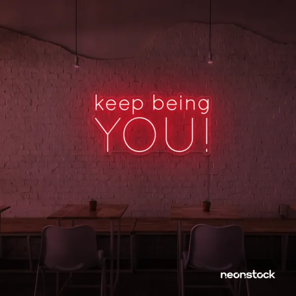 Keep Being You neon sign in red for empowerment decor, teen rooms, and creative wall spaces.