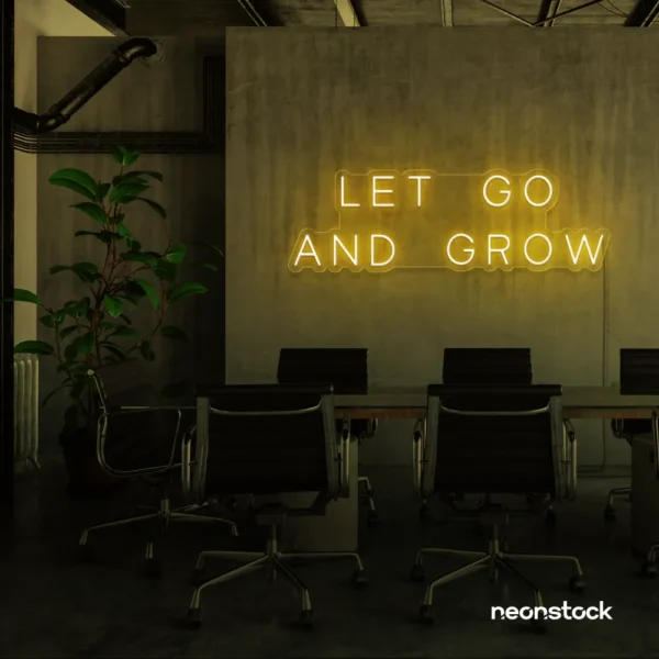 Let Go and Grow neon sign in deep green for growth mindset decor, wellness rooms, and modern inspiration walls.