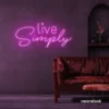 Live Simply neon sign in pink for minimalist decor, peaceful homes, and calming interiors.
