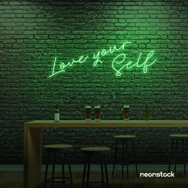 Love Yourself neon sign in green for self-love decor, beauty rooms, and empowering spaces.