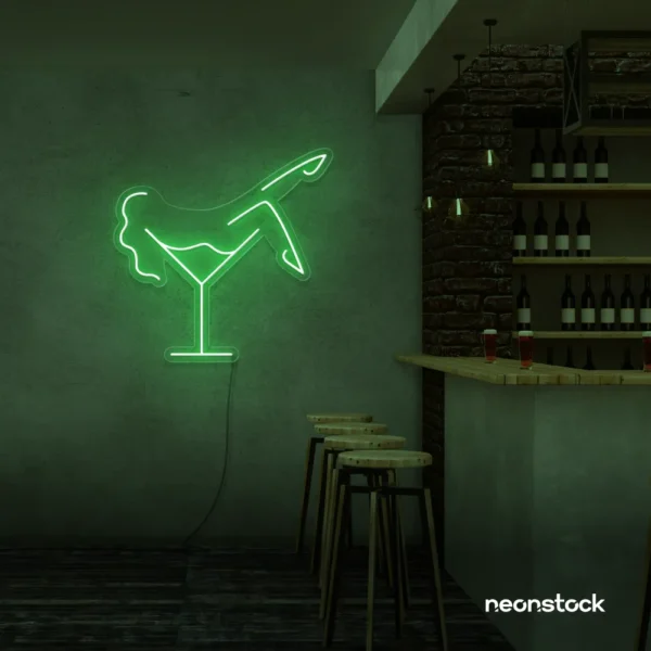 Martini girl neon sign in green for vibrant bar lighting and signage.
